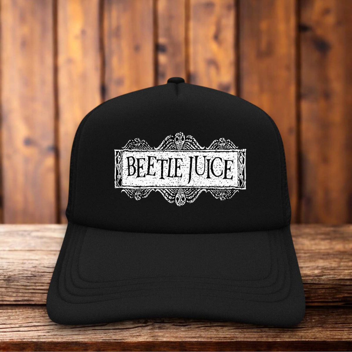 Tim Burton's Beetlejuice 1988 horror comedy vintage design on a black and white mesh retro trucker hat
