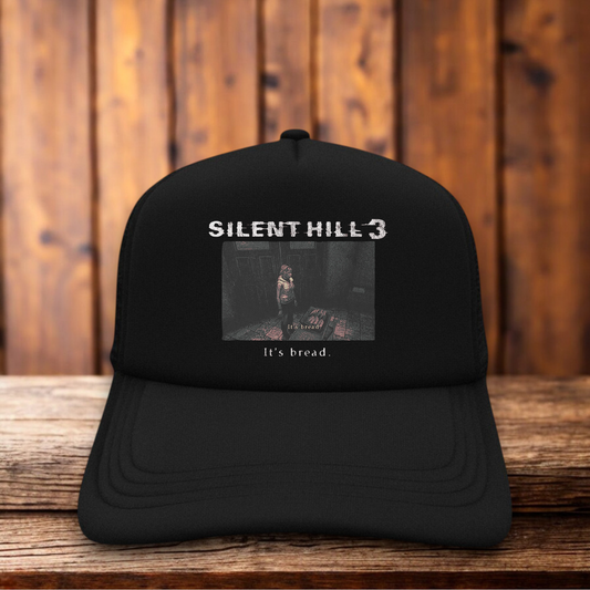 Silent Hill 3 It's Bread video game meme design on a black and white mesh retro trucker hat by Retro Roots Headwear
