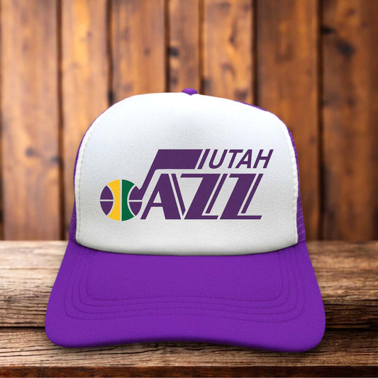 Retro trucker hat featuring the vintage 90s Utah Jazz mountain logo on a structured foam front.