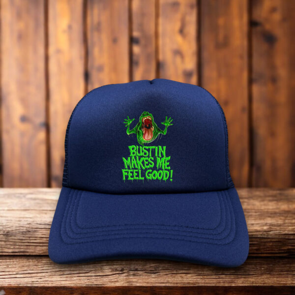 Ghostbusters “Bustin’ Makes Me Feel Good” trucker hat with Slimer design and mesh back.