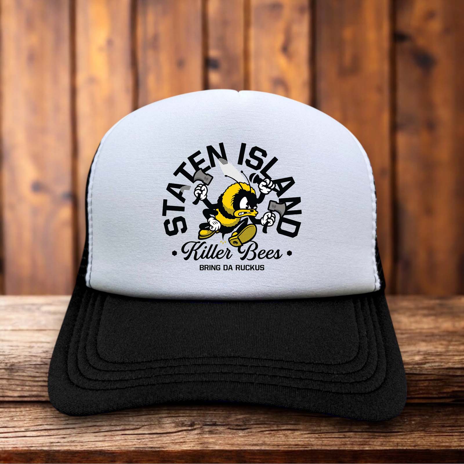 A black and white trucker hat featuring a white foam front with the iconic Wu-Tang Killa Beez logo and black mesh back.