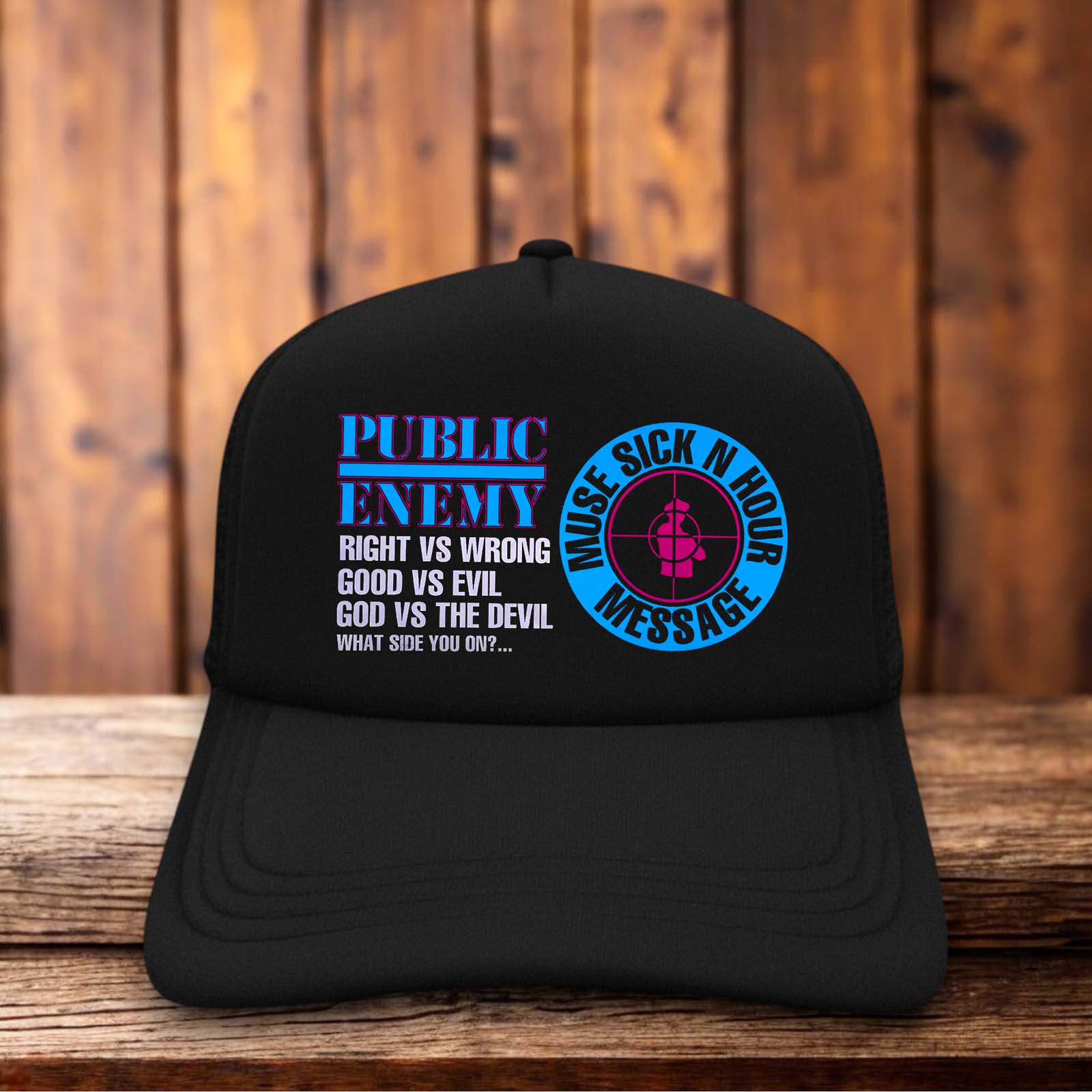 An all-black retro trucker hat featuring the Public Enemy "Muse Sick-n-Hour Mess Age" text in bold white typography on a structured foam front.