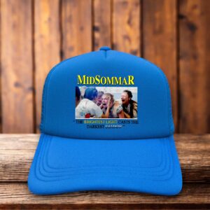 A retro trucker hat featuring a vibrant floral crown graphic and the Midsommar title logo on a structured foam front with blue mesh.