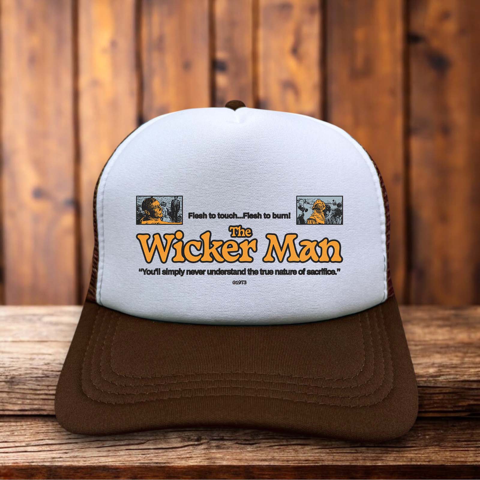 Retro trucker hat featuring The Wicker Man 1973 title in weathered vintage typography on a structured foam front.