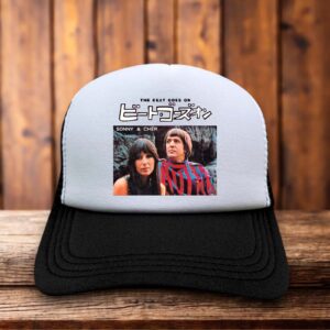 Retro trucker hat featuring "The Beat Goes On" in 60s bubble font with Japanese characters below it on a structured foam front.