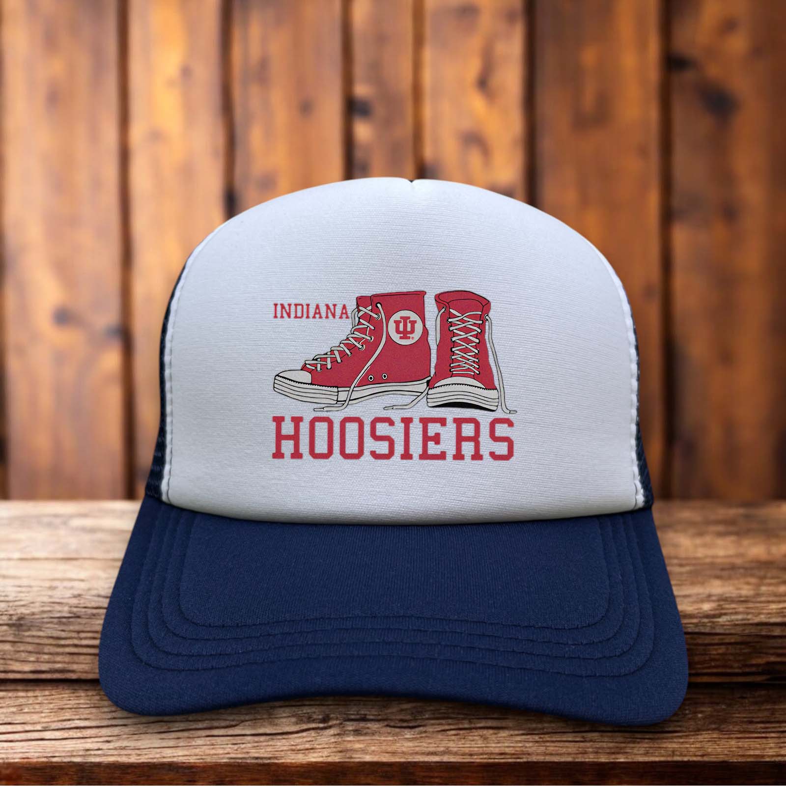 A two-toned polyester trucker hat featuring a vintage Indiana Hoosiers basketball logo.