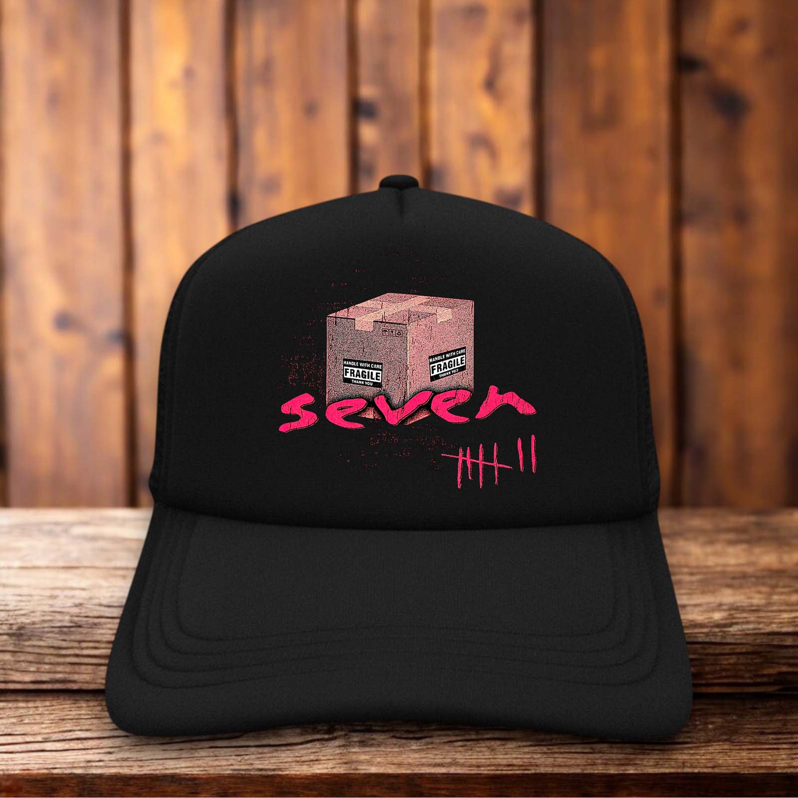 Retro trucker hat with a structured foam front featuring the Se7en film logo with stylized numerical typography and vintage horror graphics.