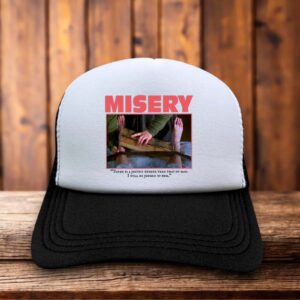 Retro trucker hat with a structured foam front featuring the Misery book-style logo and vintage typewriter-inspired typography.