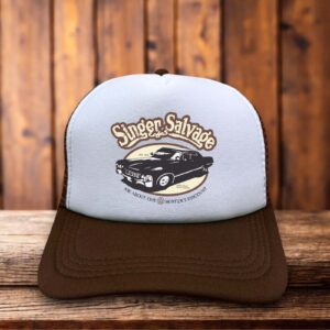 A vintage brown foam trucker hat featuring the Singer Salvage auto wrecking logo