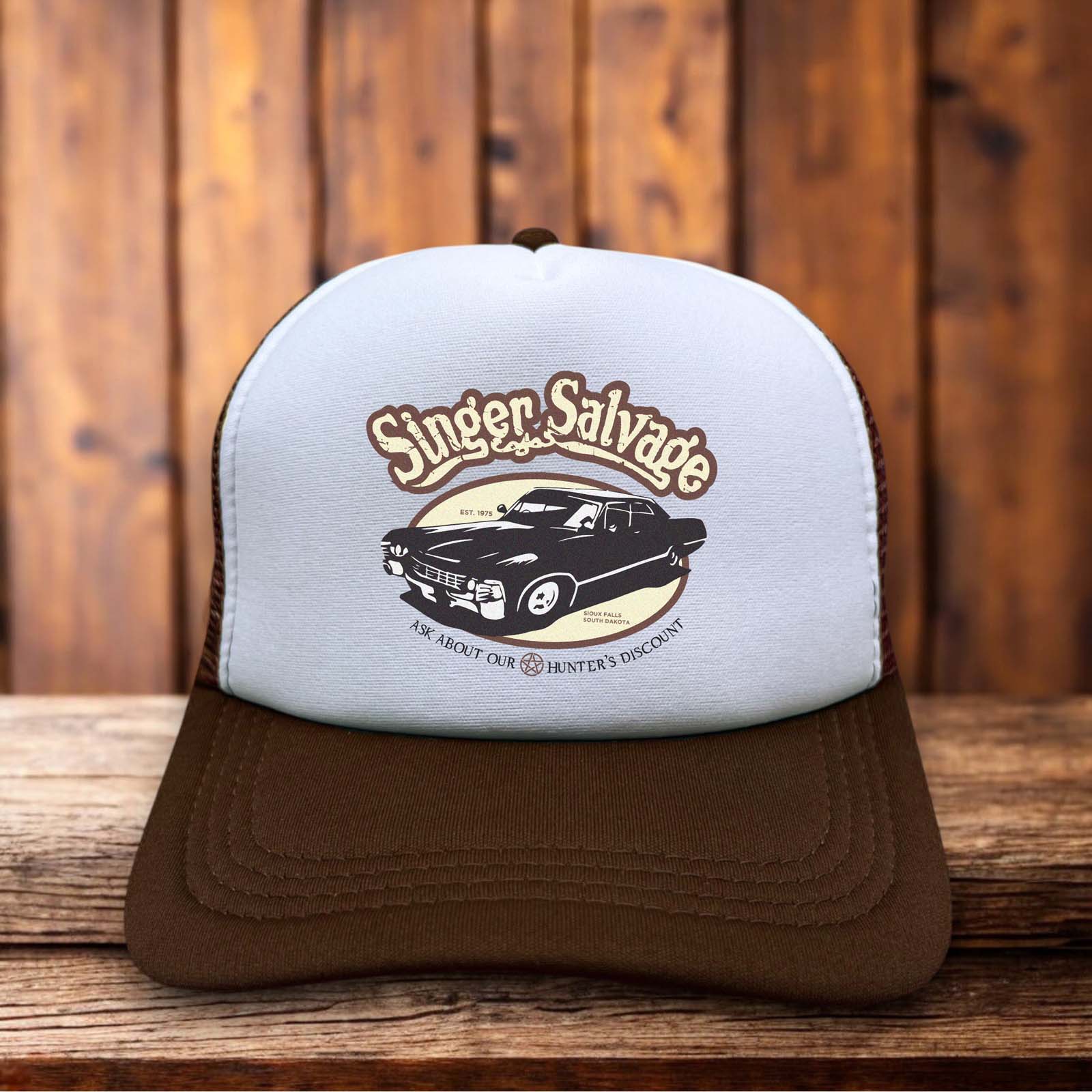 A vintage brown foam trucker hat featuring the Singer Salvage auto wrecking logo