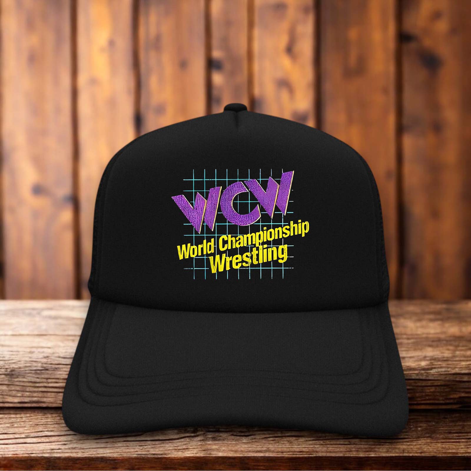 Retro trucker hat with a structured foam front featuring the classic WCW World Championship Wrestling logo and sharp vintage typography.