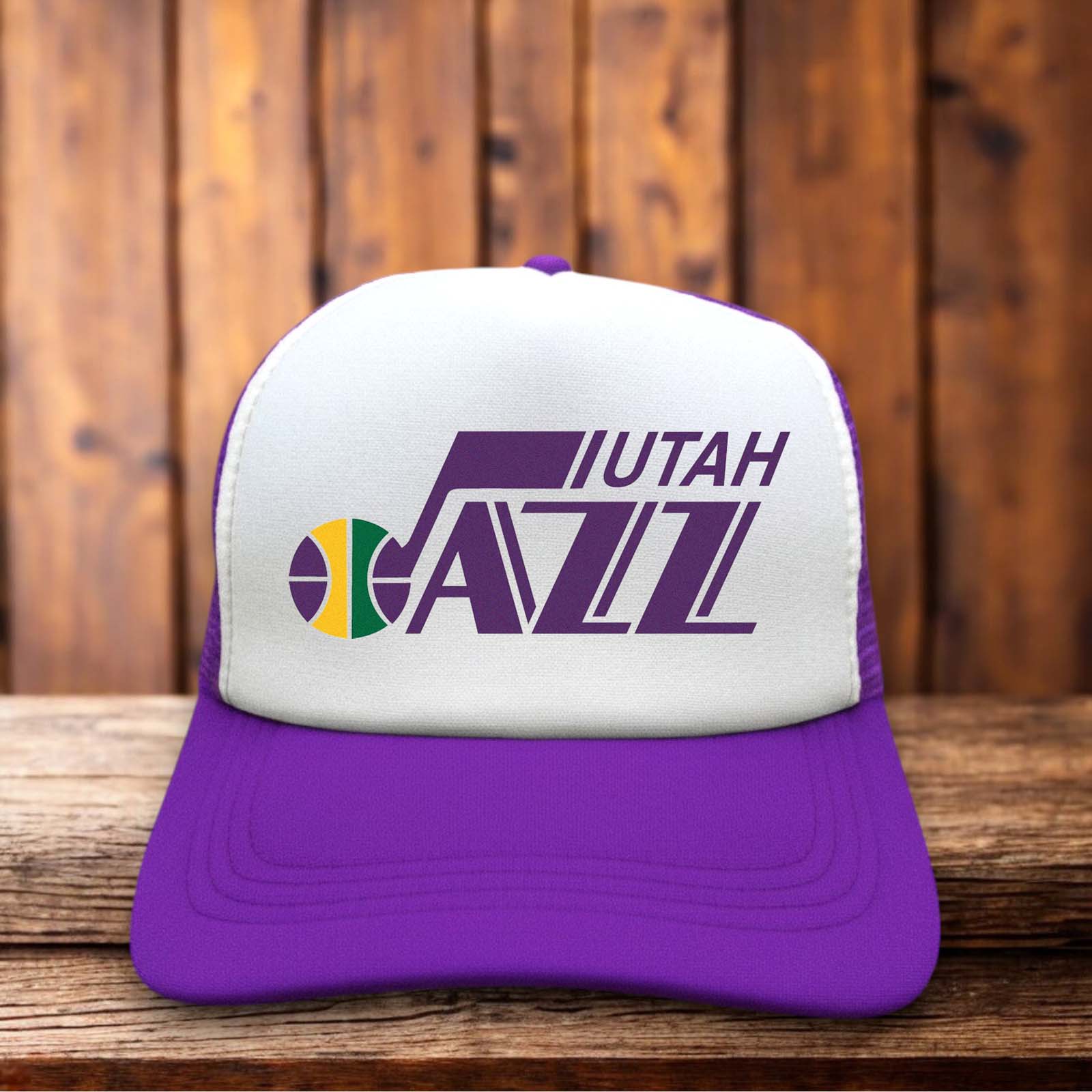 Retro trucker hat featuring the vintage 90s Utah Jazz mountain logo on a structured foam front.