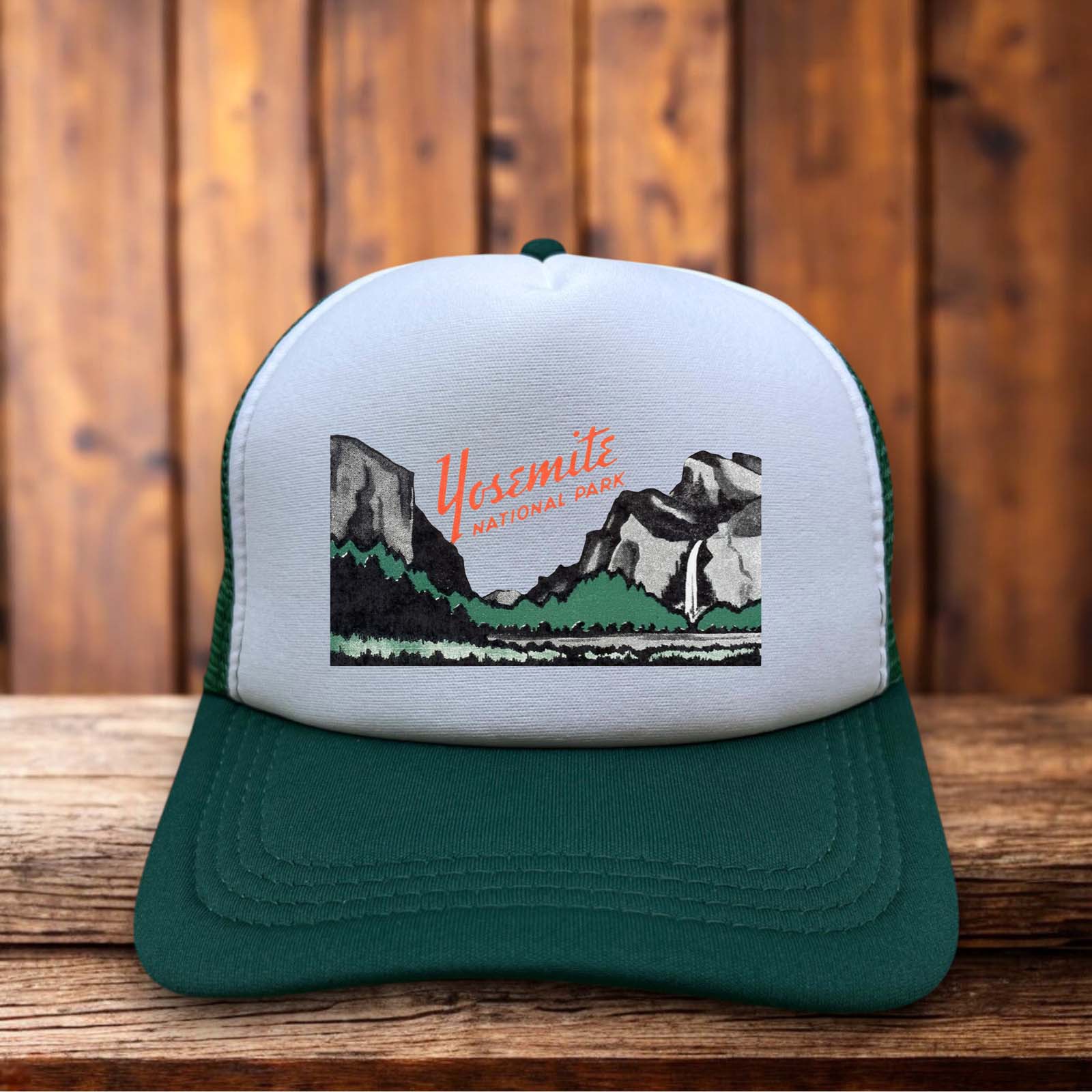 Green retro trucker hat featuring a Yosemite National Park design in vintage-style typography on a structured foam front.