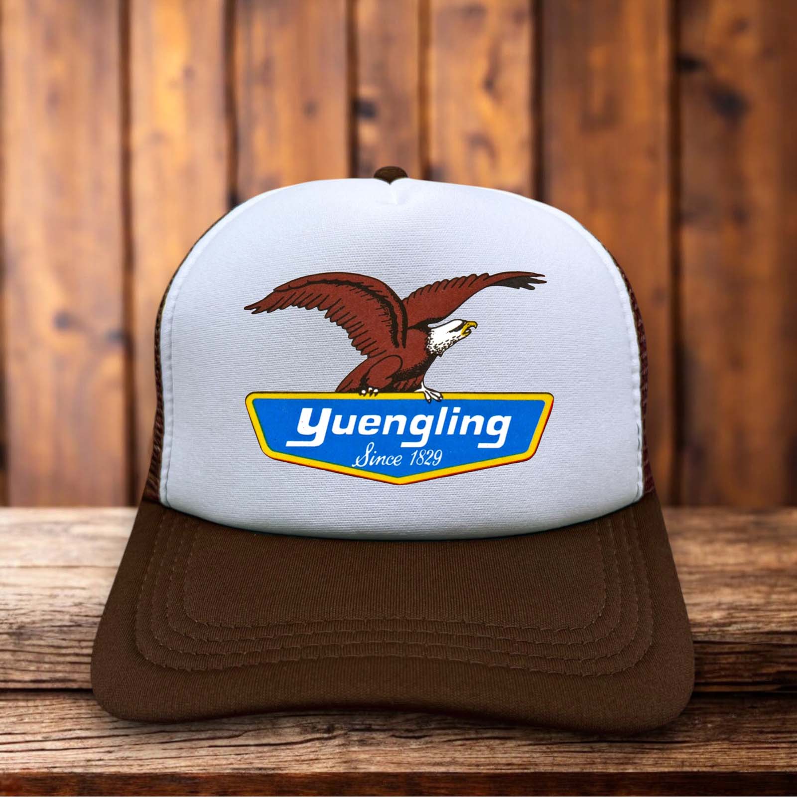 Retro trucker hat featuring the Yuengling Eagle logo in vintage-style typography on a structured foam front.