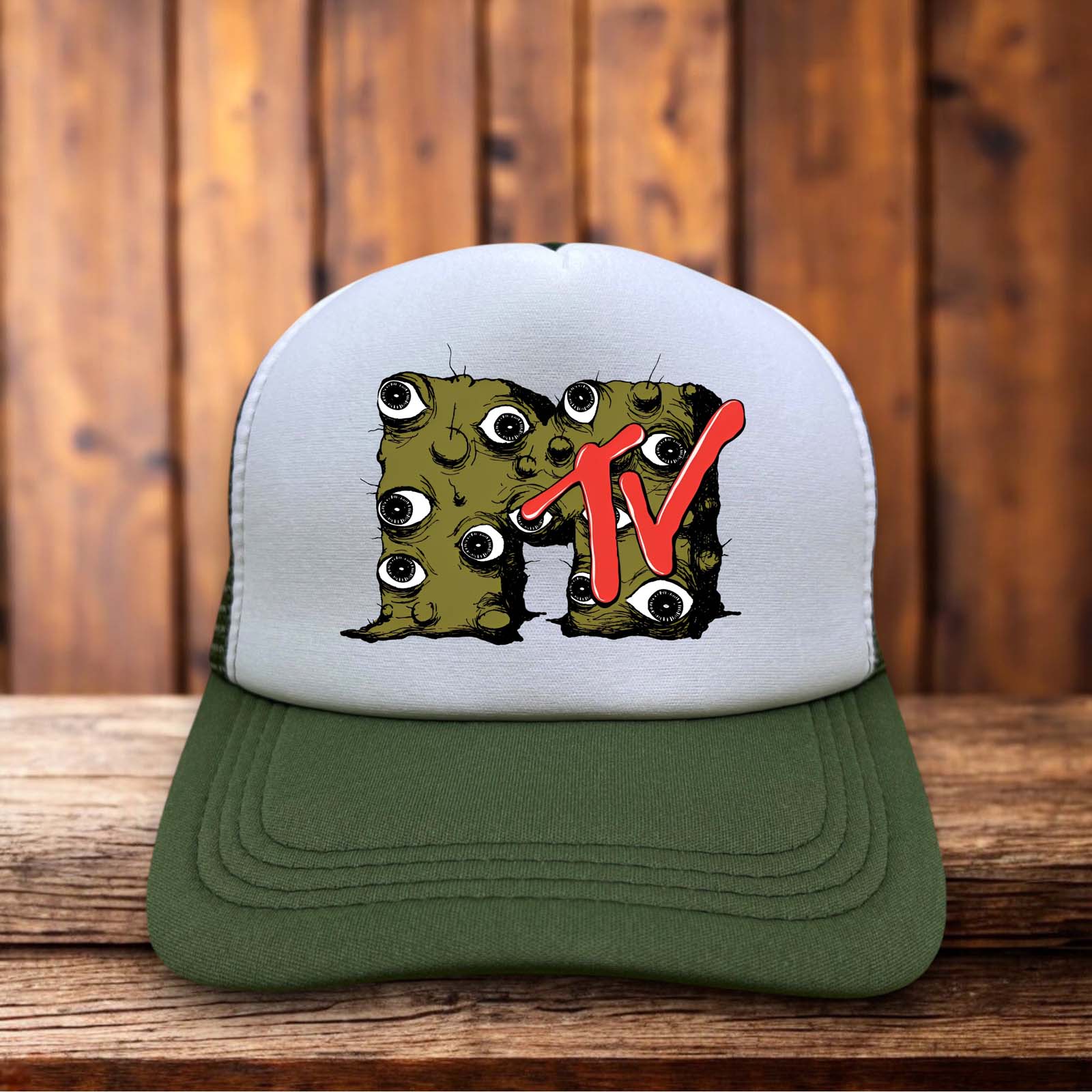 A retro trucker hat with a white foam front featuring the iconic MTV logo transformed with surrealist eyeball illustrations in a vibrant 80s aesthetic.