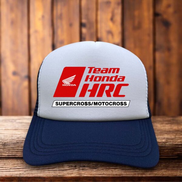 A racing trucker hat with a red and white foam front featuring the iconic blue and red HRC Honda Racing Corporation logo.