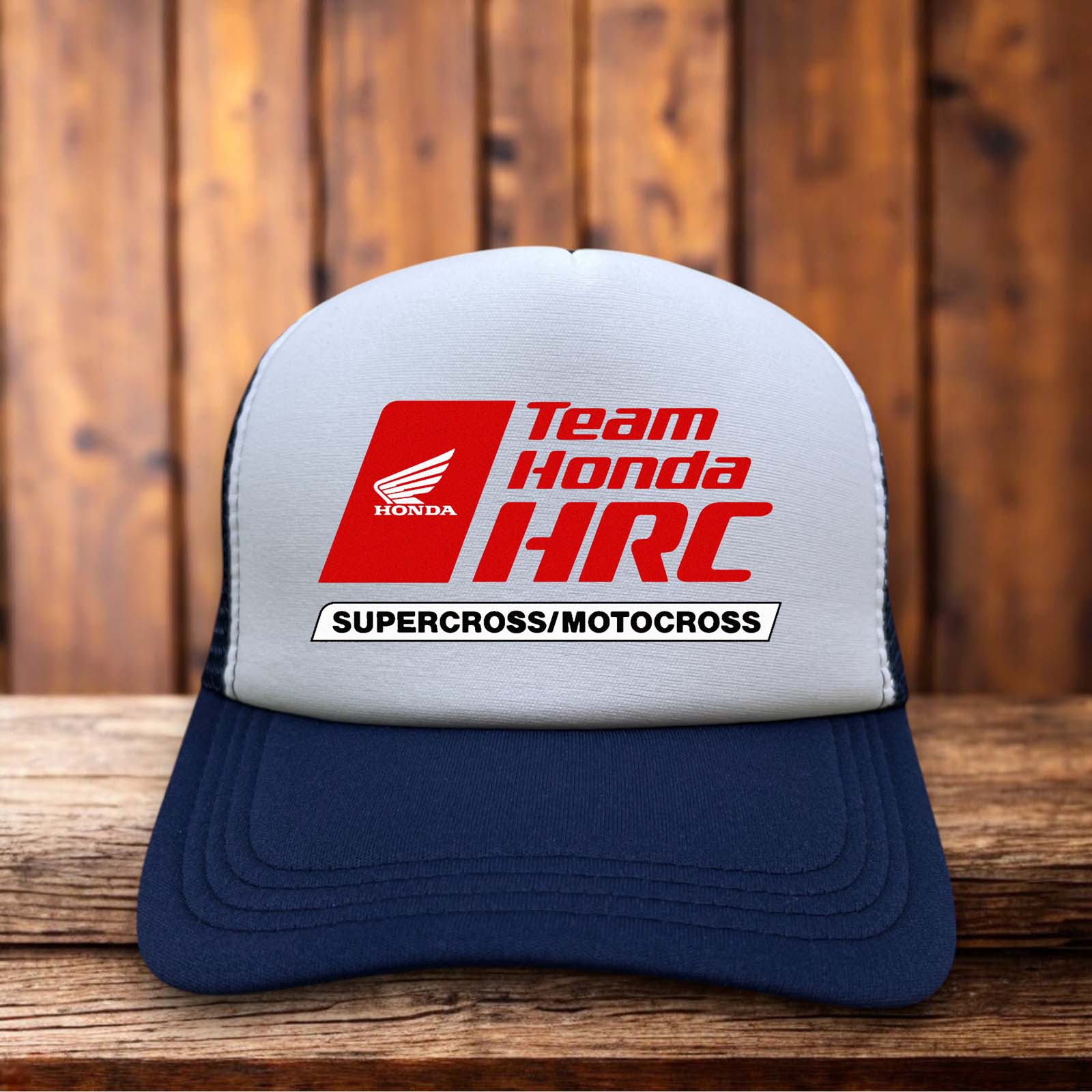 A racing trucker hat with a red and white foam front featuring the iconic blue and red HRC Honda Racing Corporation logo.